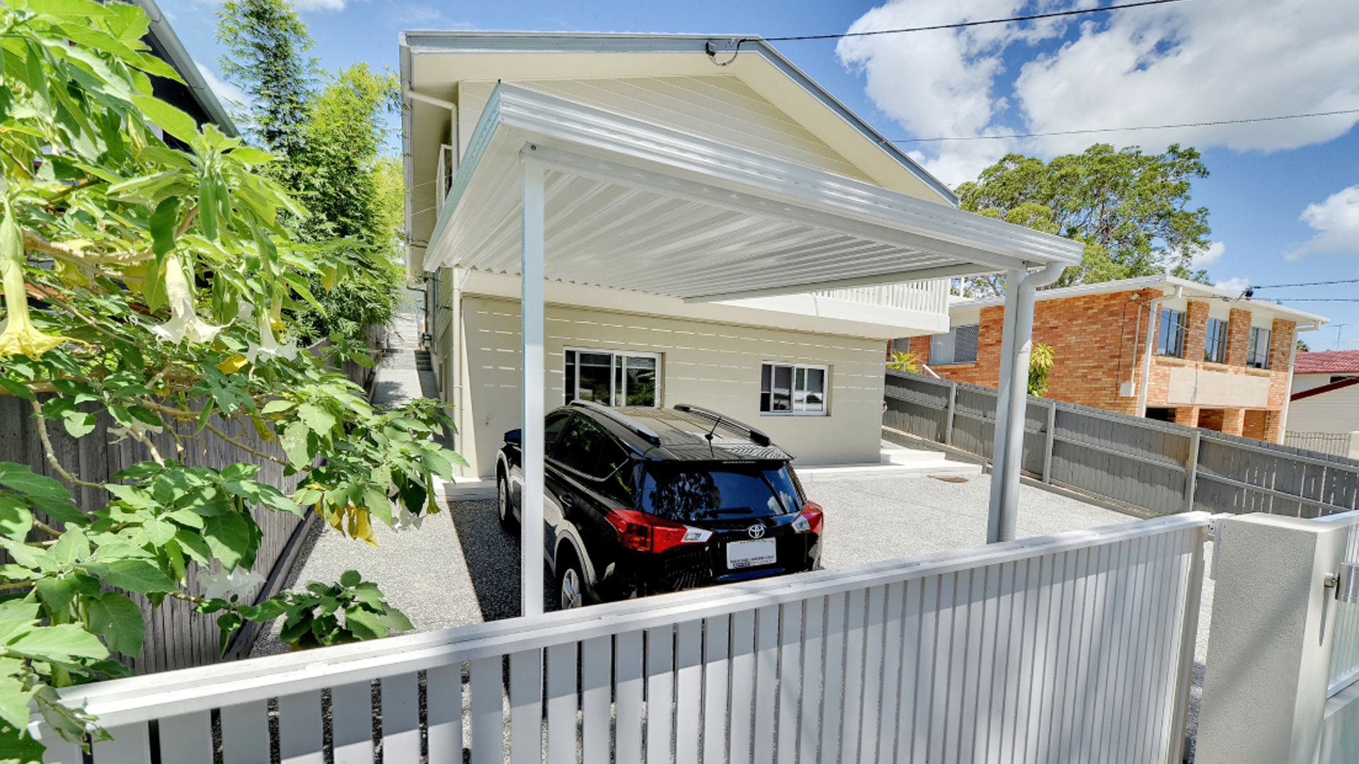 Altec Carport and a front gate