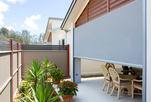 A backyard with flyover patio