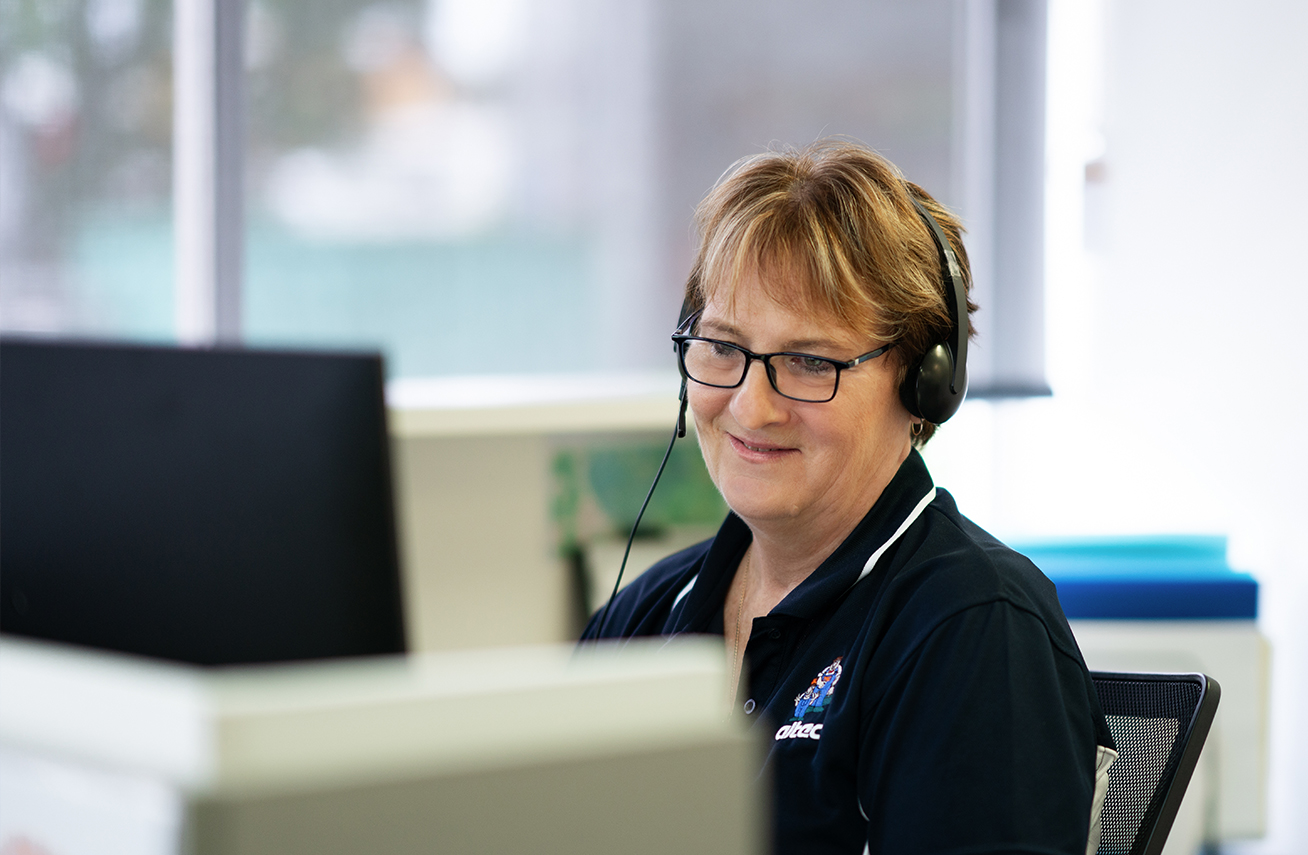 Altec employee at reception desk