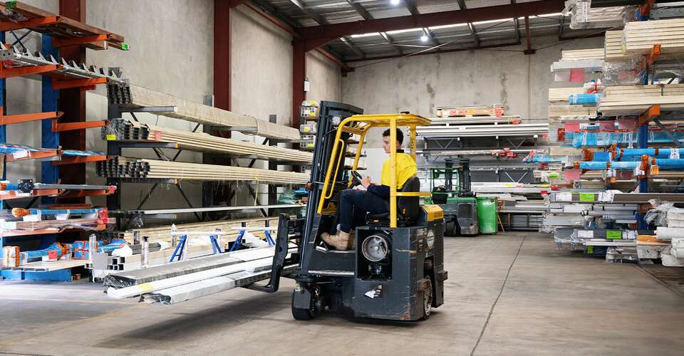 Altec warehouse staff on forklift